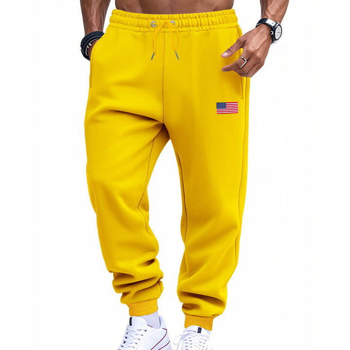 Men's slim-fit sweatpants with tapered leg, elastic drawstring waistband, and discreet flag application Mune Fashion