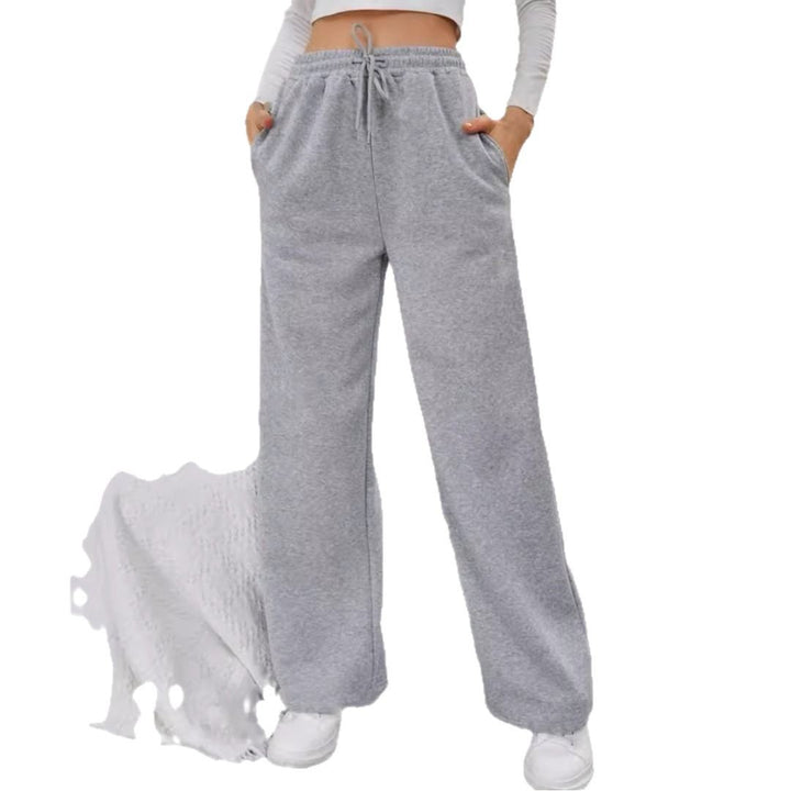 Women's High-Waist Wide-Leg Jogging Pants with elastic comfort waistband, drawstring, and deep side pockets Mune Fashion