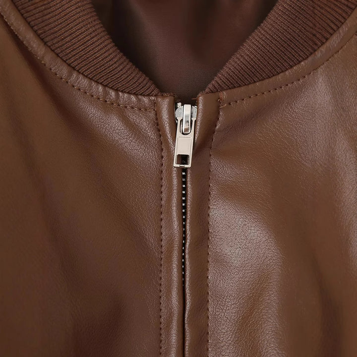 Women's fitted short faux leather bomber jacket with sleeve zipper and ribbed cuffs Mune Fashion