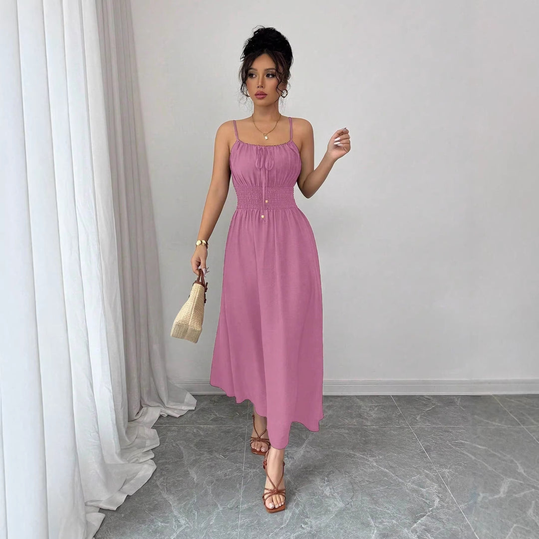Women’s midi dress with smocked waistband, spaghetti straps, and tie cord Mune Fashion