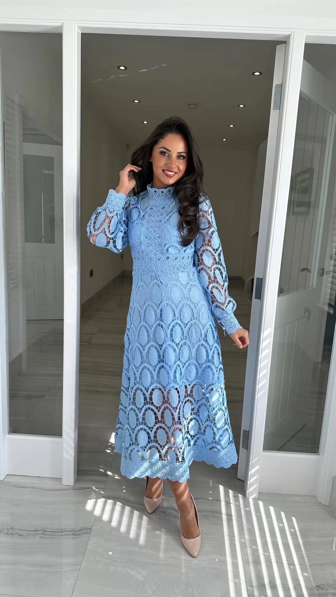 Women's crocheted midi dress with stand-up collar, transparent lace sleeves, and fitted A-line Mune Fashion