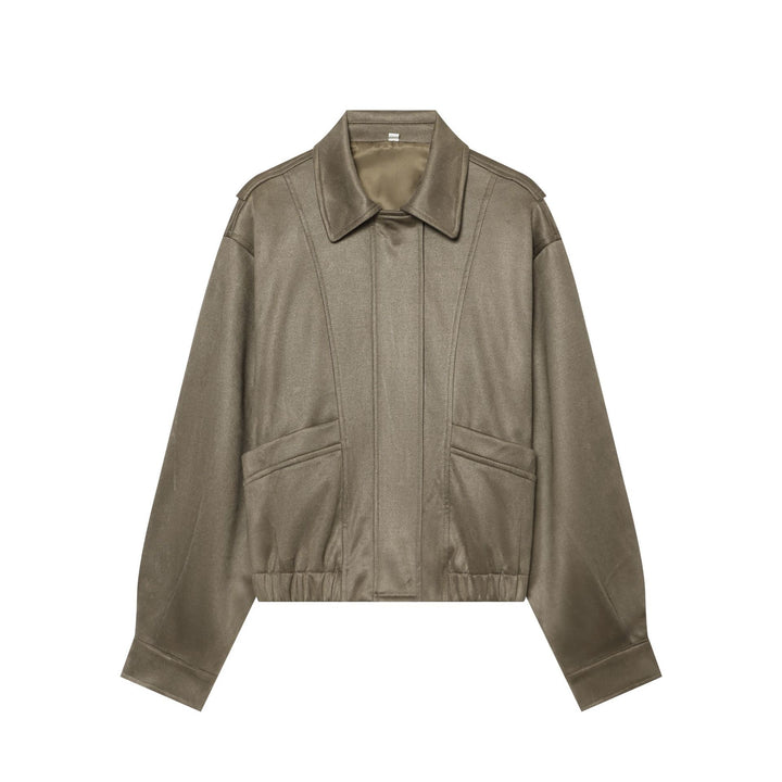 Women's cropped blouson jacket in suede look with shirt collar, epaulettes, and elastic waistband.