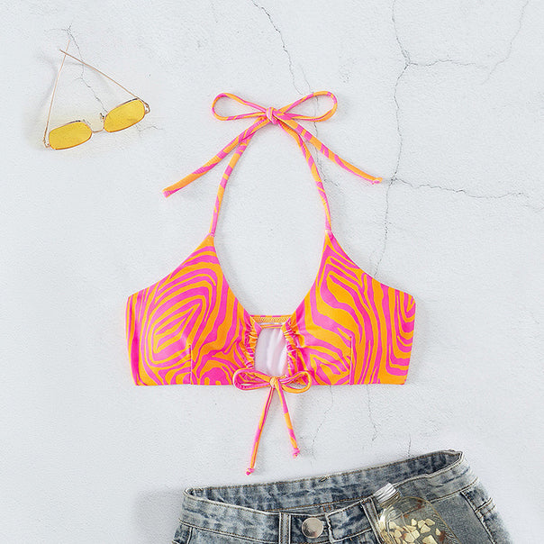 Women's bandeau bikini top with playful zebra pattern and tie detail
