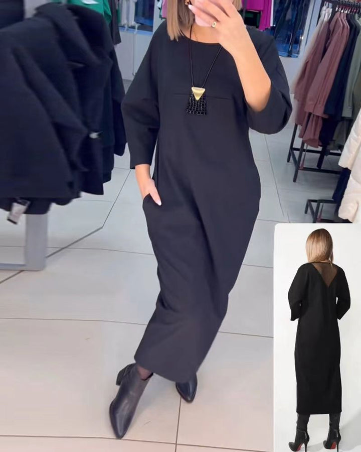 Women's straight maxi dress with ankle-length silhouette, half-length sleeves, side pockets, and transparent V-back Mune Fashion