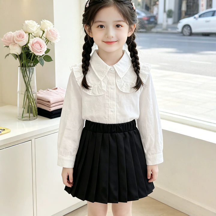 Girls blouse with ruffle details Mune Fashion