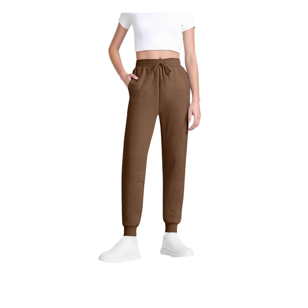 Women's slim high-waisted joggers with drawstring, side pockets, and cuffs Mune Fashion
