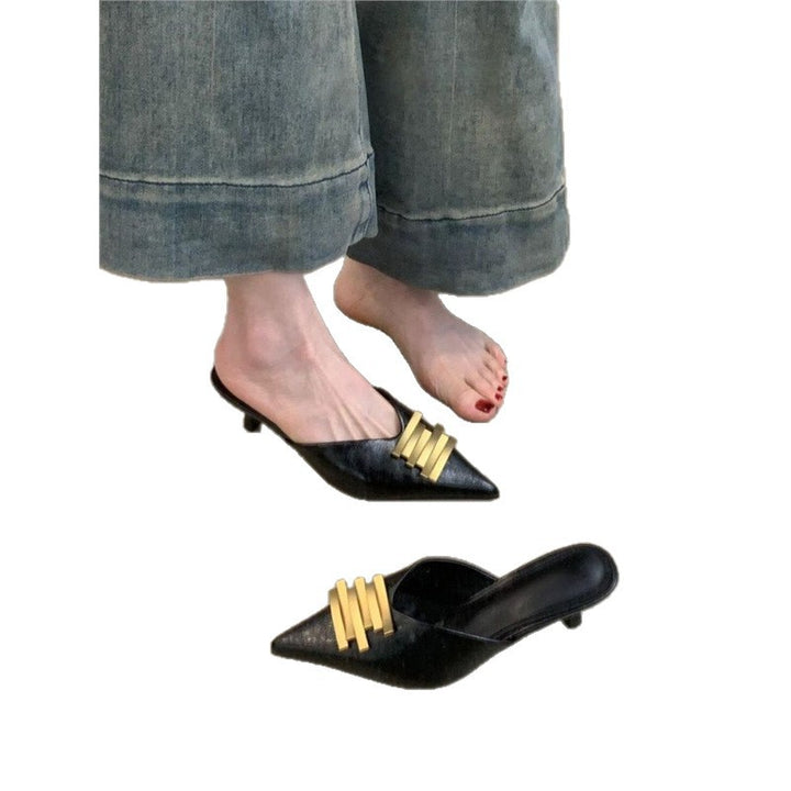 Ladies pointed toe leather look mules with sculpted kitten heel and gold wave appliqué Mune Fashion