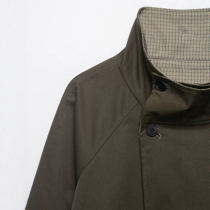 Women's short cape coat with high stand-up collar, concealed button placket and slanted pockets Mune Fashion