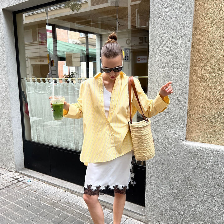 Women's loose oversized shirt blouse with classic collar, full button placket, and rounded hem Mune Fashion