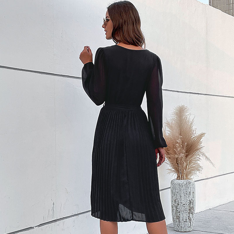 Women's midi dress with pleated skirt, V-neck, transparent sleeves, and waist belt Mune Fashion