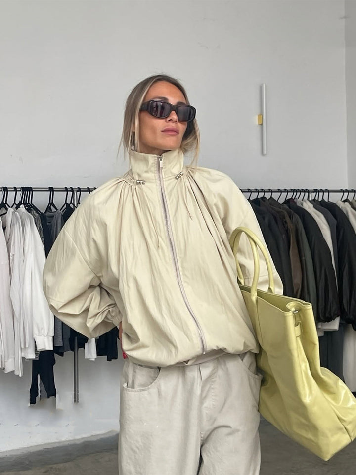 Women's Oversize Windbreaker with high stand-up collar, drawstring shoulder yoke, and balloon sleeves Mune Fashion