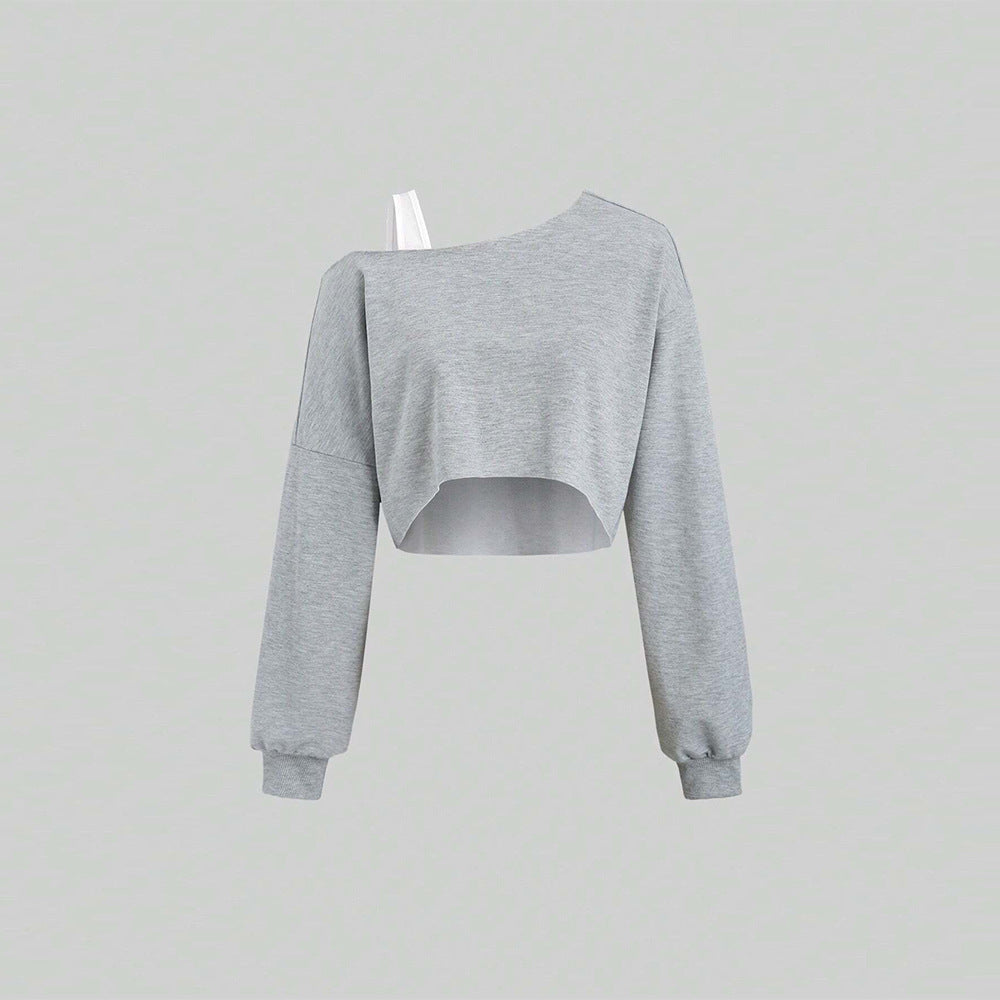 Women's cropped off-shoulder sweatshirt with one-sided strap, balloon sleeves, and ribbed cuffs.