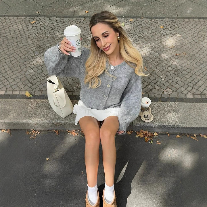 Women's cropped chunky knit cardigan with oversized balloon sleeves and visible button placket Mune Fashion