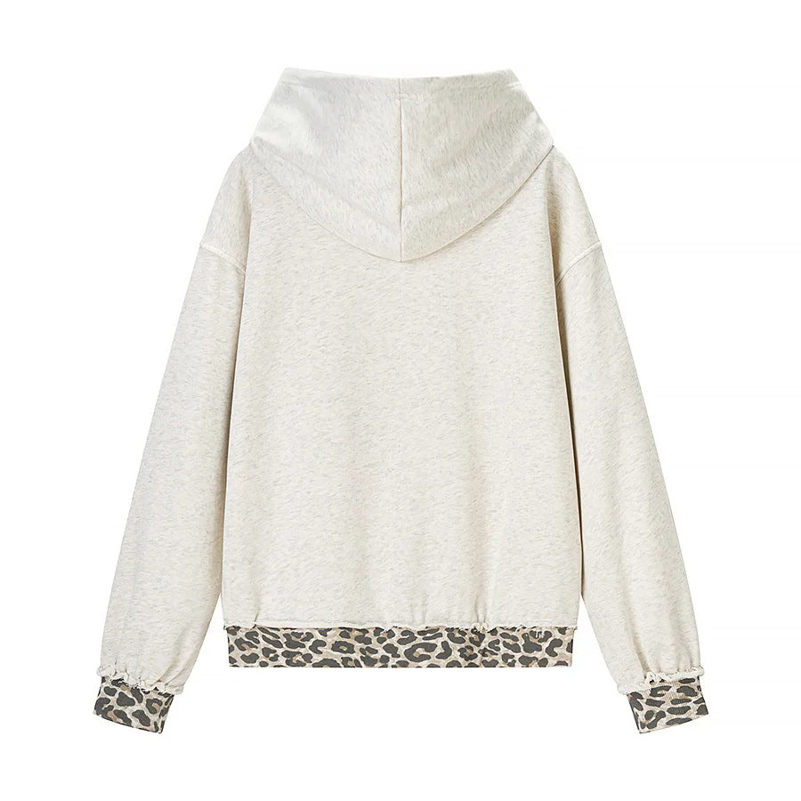 Women's oversized hoodie with leopard pattern lining, kangaroo pocket, and vintage effect Mune Fashion