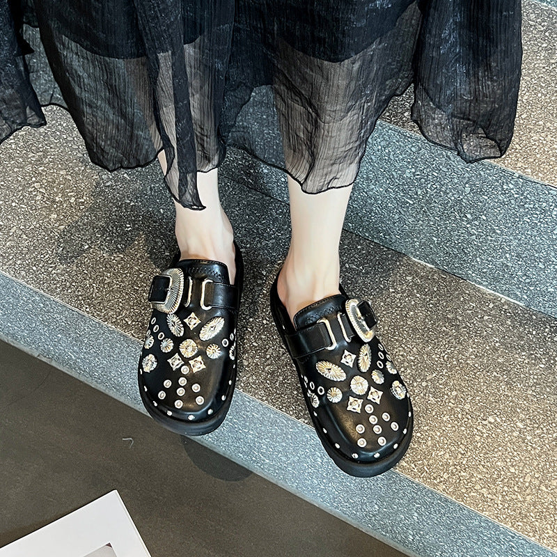 Ladies' leather platform mules with decorative eyelets and decorative buckle application Mune Fashion