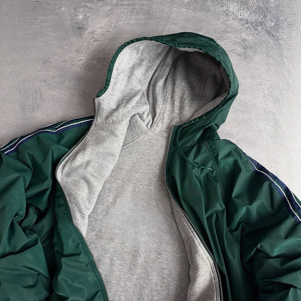 Unisex non-fitted windbreaker with hood padded fleece lining drawstring hem and decorative stripes on sleeves Mune Fashion