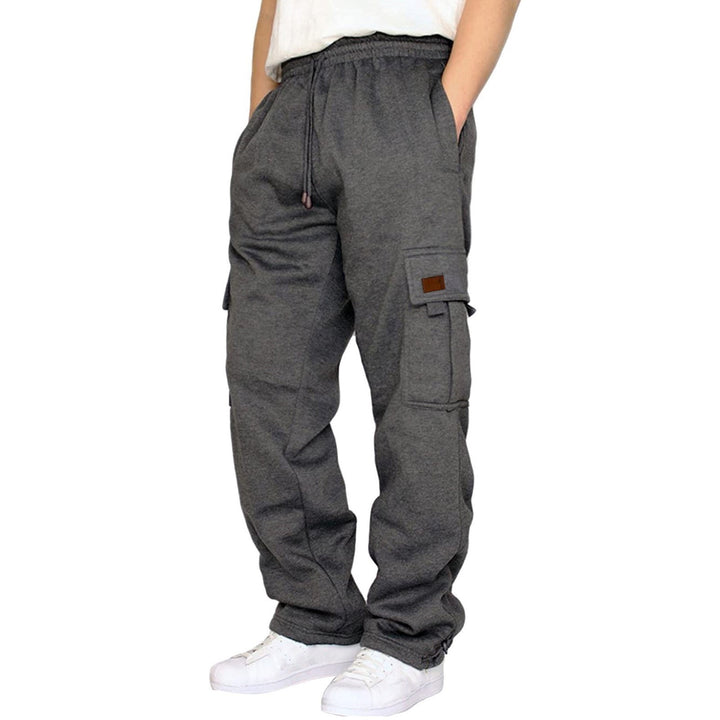 Men's tapered sweat cargo pants with elastic waistband, drawstring, and flap pockets Mune Fashion