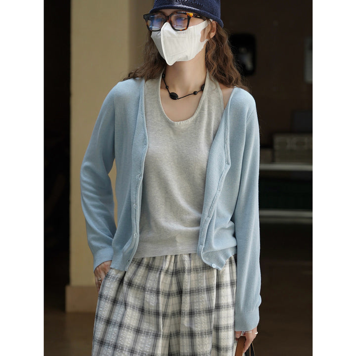 Women's fine knit cardigan with open front, ribbed hem and boxy silhouette Mune Fashion