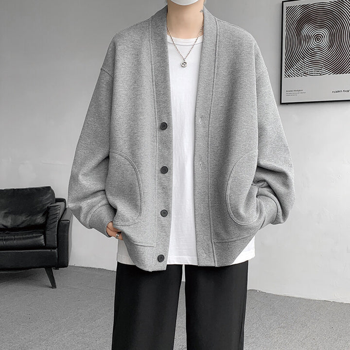 Men's oversized knit cardigan with V-neck, patch round pockets and casual drop shoulder silhouette Mune Fashion