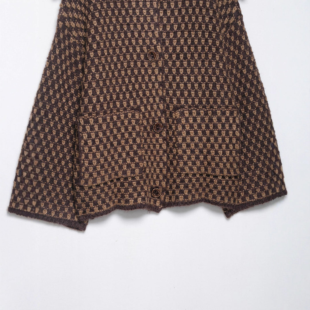 Women’s short jacket in boucle waffle pattern with large lapel collar Mune Fashion