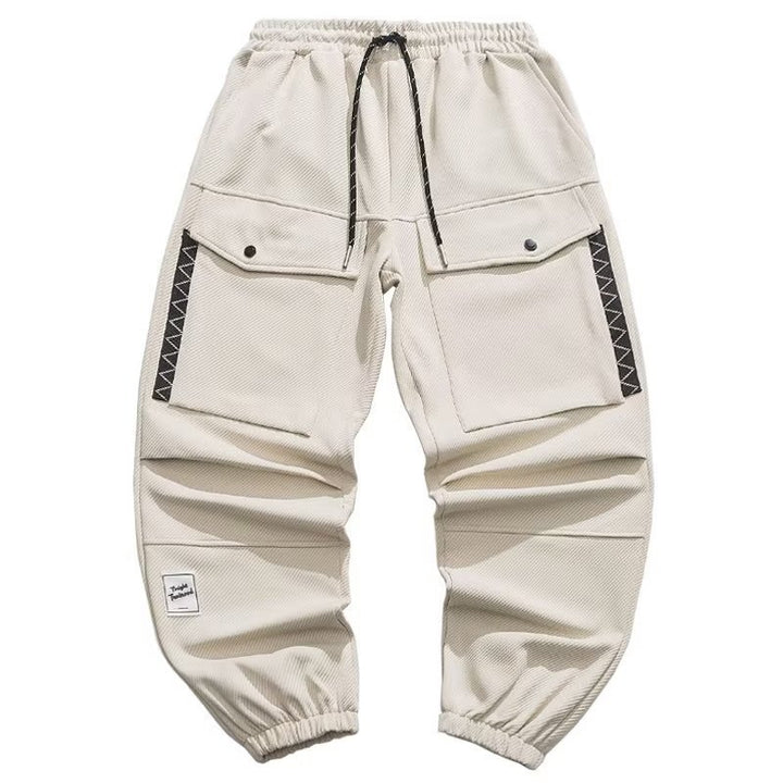 Men's wide cargo jogging pants with drawstring, flap pockets, and elastic cuffs Mune Fashion