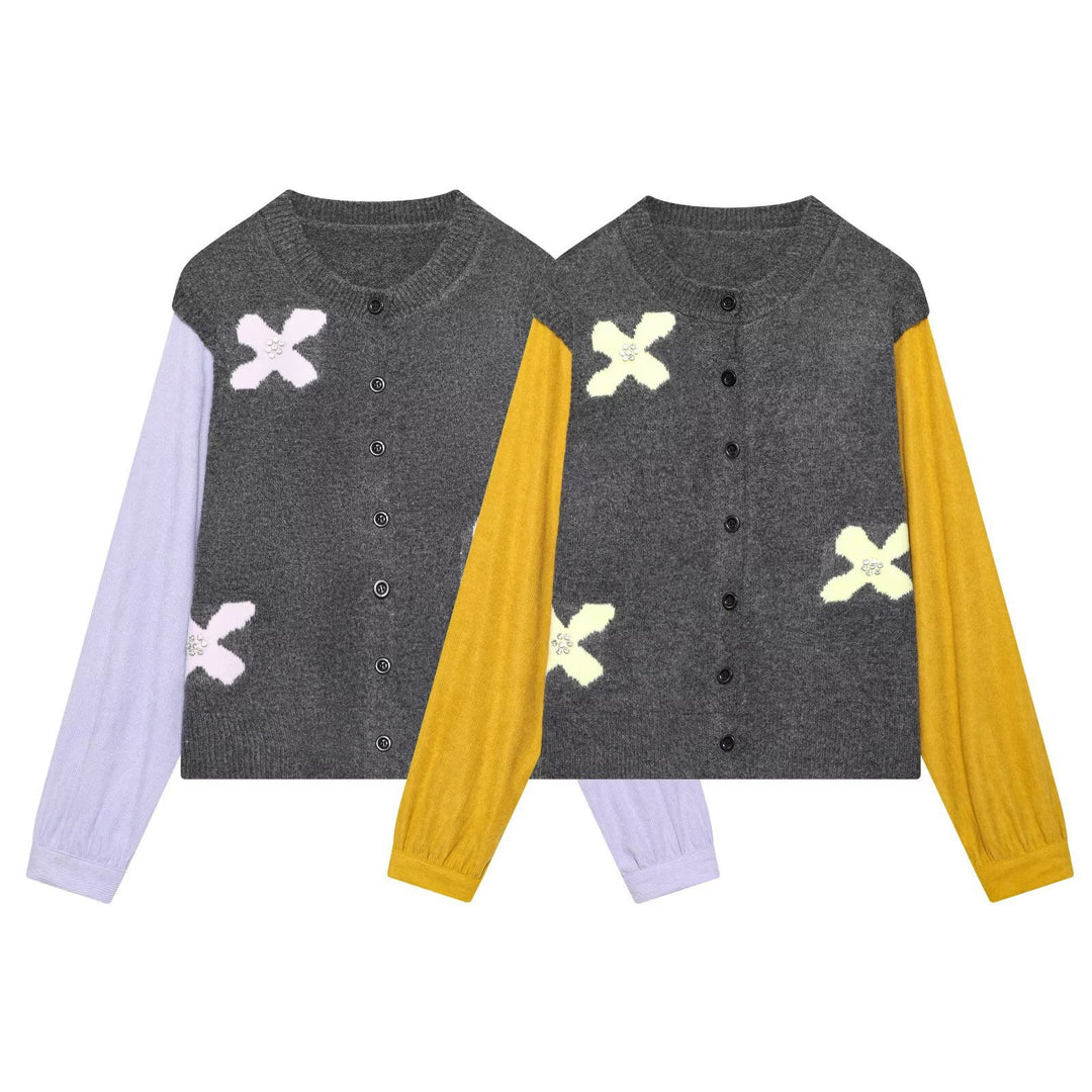 Women's knitted cardigan with decorative flower appliqué and contrast sleeves Mune Fashion