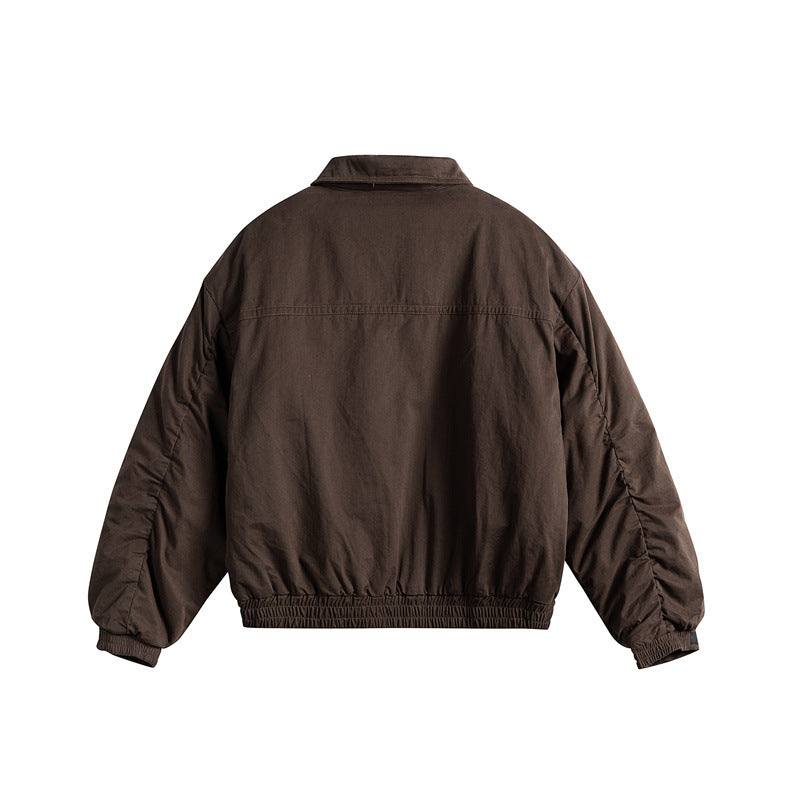 Men's short boxy blouson with shirt collar, utility chest pockets, and elastic hem Mune Fashion