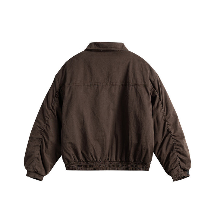 Men's short boxy blouson with shirt collar, utility chest pockets, and elastic hem Mune Fashion