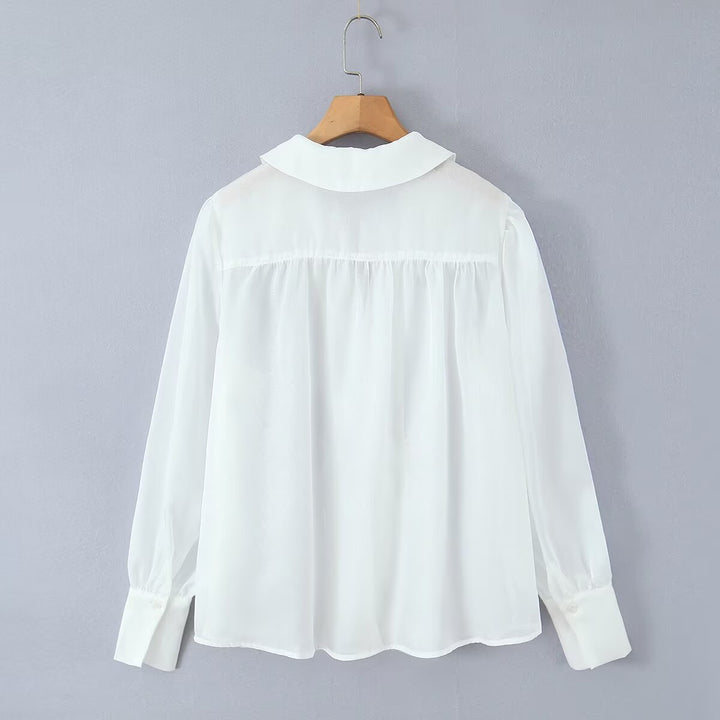 Ladies transparent chiffon blouse with volume sleeves, lace trim and wide cuffs
