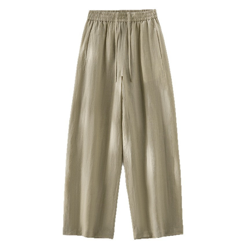 Women's wide linen look trousers with high elastic waistband and flowing wide leg silhouette Mune Fashion