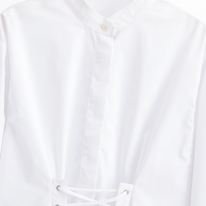 Women's short blouse with stand-up collar, cord corsage at the hem and voluminous sleeves Mune Fashion