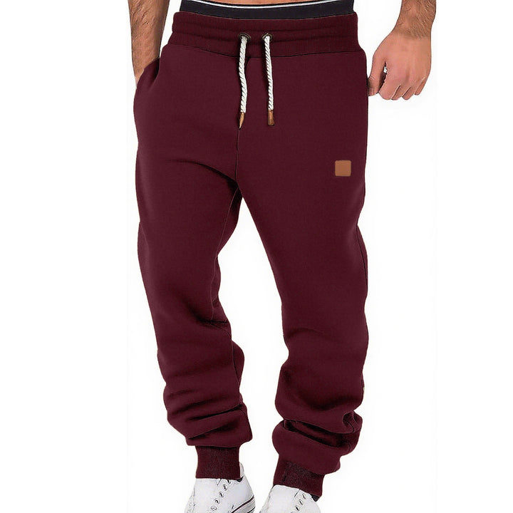 Men's comfortable jogging pants made of high-quality cotton blend with elastic waistband, drawstring, and cuffs Mune Fashion