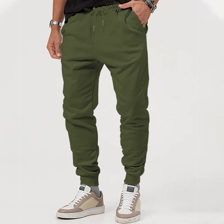 Men's jersey sweatpants in a tapered cut with concealed drawstring and shape-stable ankle cuffs Mune Fashion