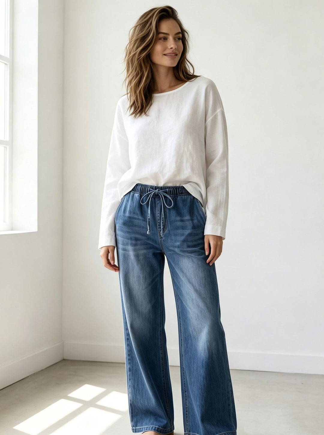 Women's Relaxed-Fit Denim Pants with elastic drawstring waistband, subtle used effect, and wide leg Mune Fashion