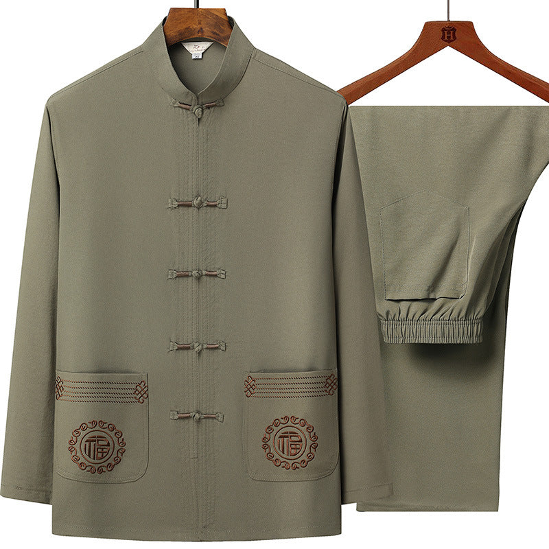 Men's traditional Tang suit set with stand collar, knot closures, and subtle embroidery details Mune Fashion