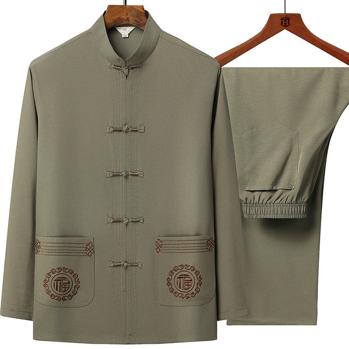 Men's traditional Tang suit set with stand collar, knot closures, and subtle embroidery details Mune Fashion