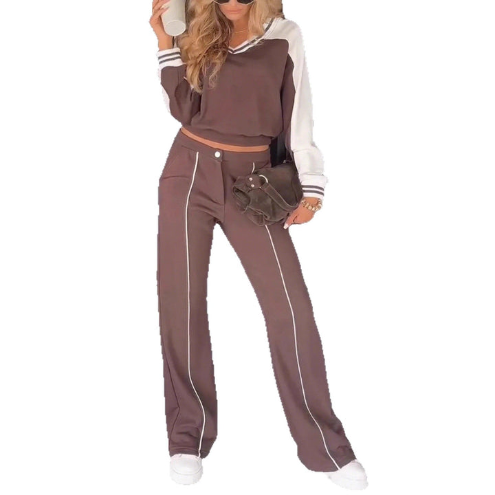 Women's sporty-elegant two-piece set made of cotton blend with V-neck sweatshirt and high-cut flared pants Mune Fashion