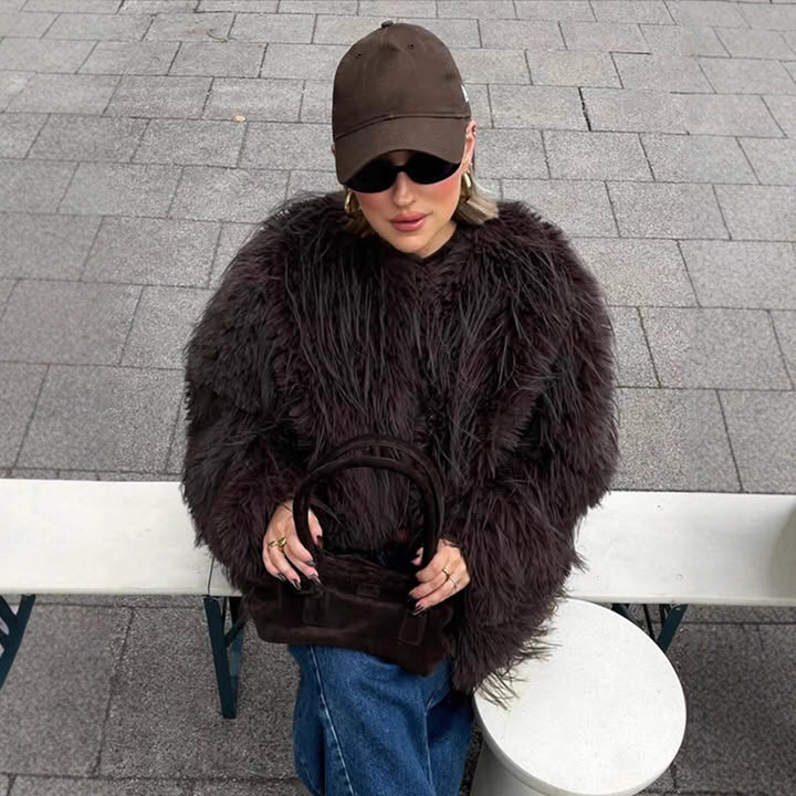 Ladies short jacket made of long-pile shaggy faux fur with hidden snap button placket Mune Fashion