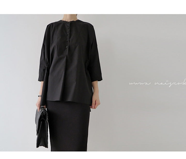 Women's oversized blouse with stand collar, balloon-shaped silhouette, and 3/4 sleeves Mune Fashion