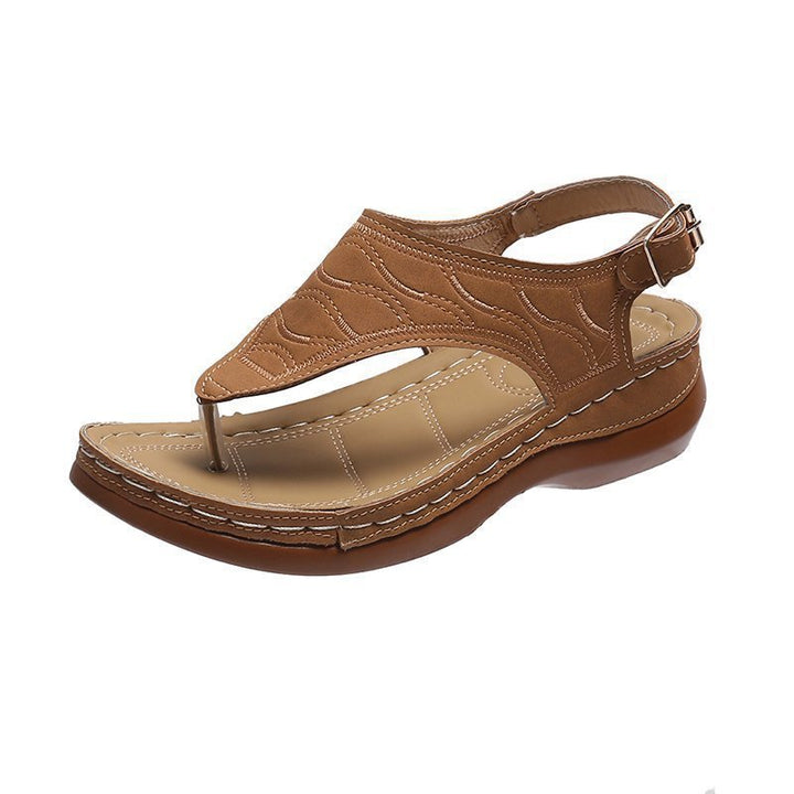 Women’s toe ring sandal with viscoelastic comfort footbed, adjustable heel strap and hand-stitched edge detail Mune Fashion