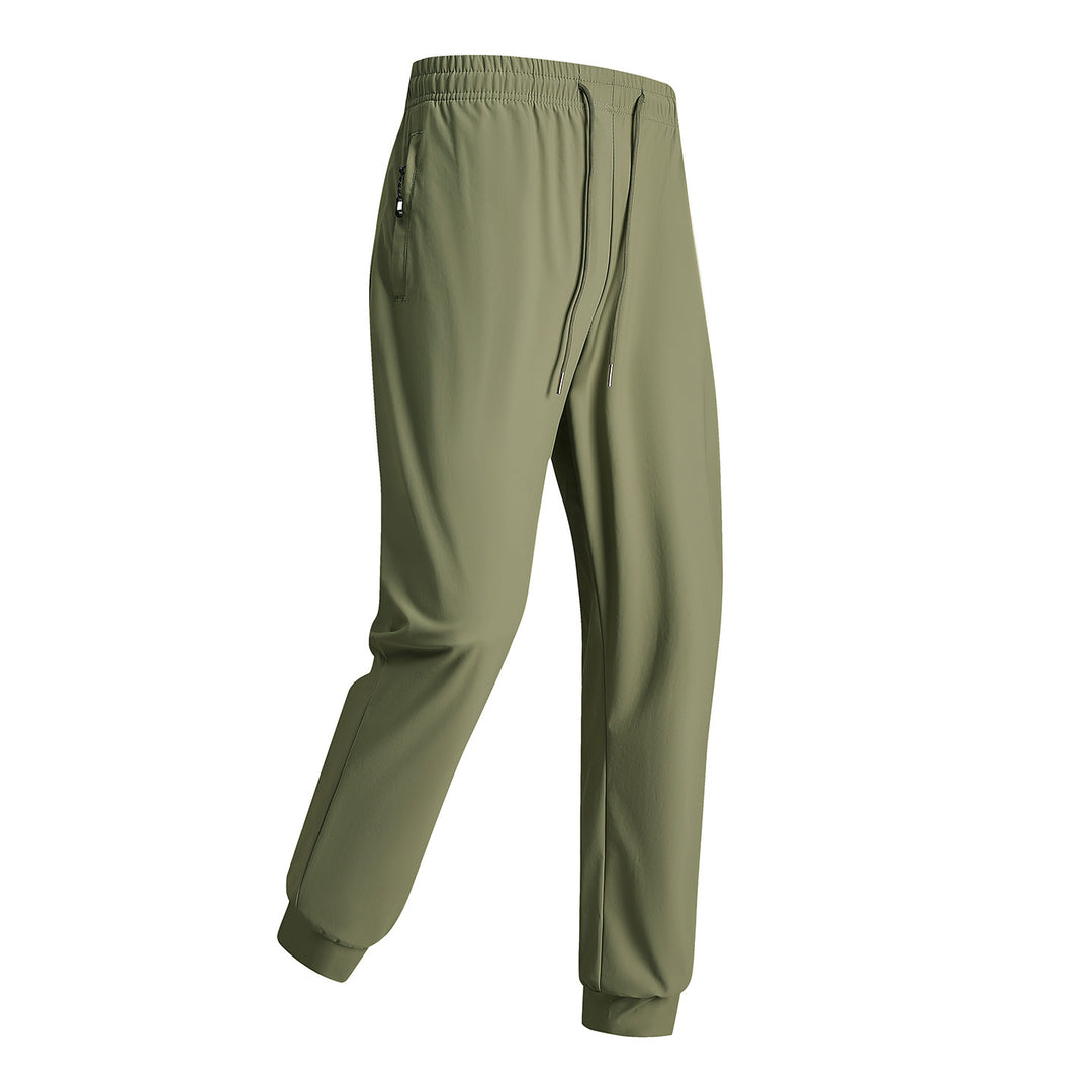 Men's sporty training pants with elastic waistband and zippered pockets Mune Fashion