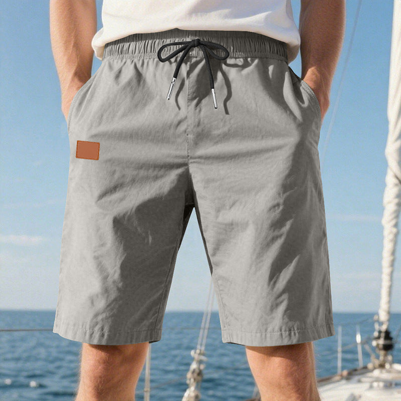Men's quick-drying swim shorts in Bermuda cut with elastic waistband and drawstring Mune Fashion