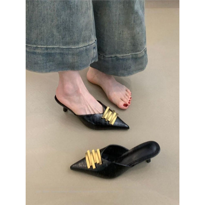 Ladies pointed toe leather look mules with sculpted kitten heel and gold wave appliqué Mune Fashion