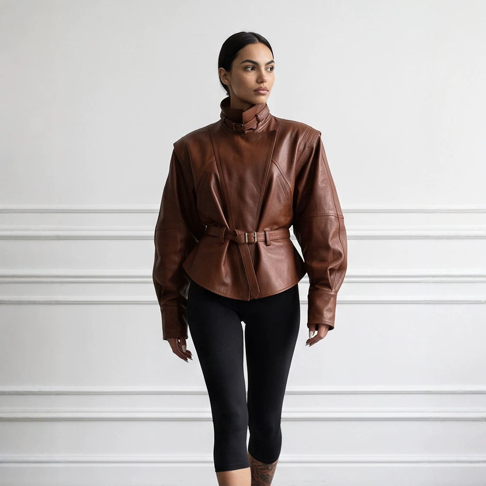 Women's tailored faux leather jacket with standing collar, neck strap, and figure-shaping waist belt Mune Fashion