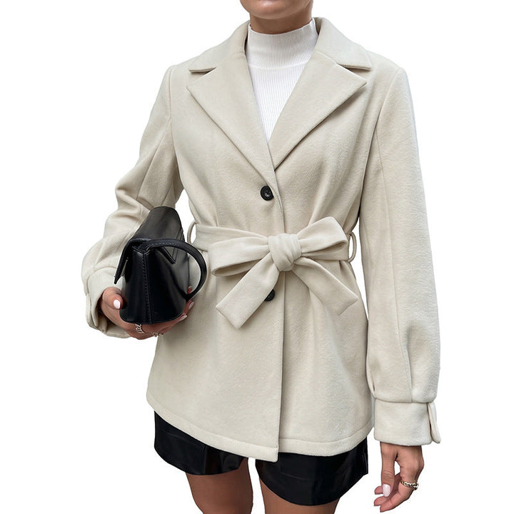 Women's short jacket with belted waist, lapel collar and button placket Mune Fashion