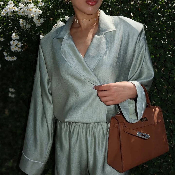 Women's satin two-piece set with wrap blouse, wide pants and elastic waistband Mune Fashion
