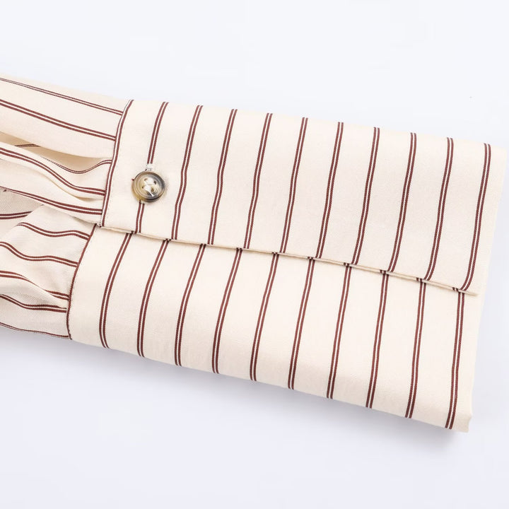 Women’s oversized blouse with stripe pattern, extended cuffs and concealed button placket Mune Fashion