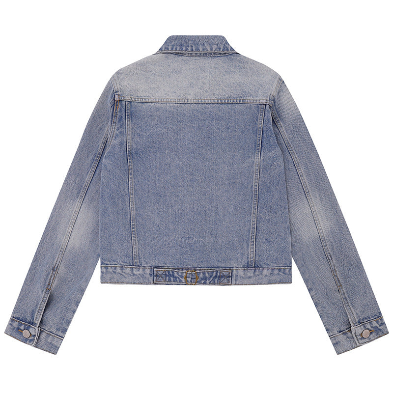 Women's short vintage denim jacket with chest pockets, zipper detail and button placket Mune Fashion