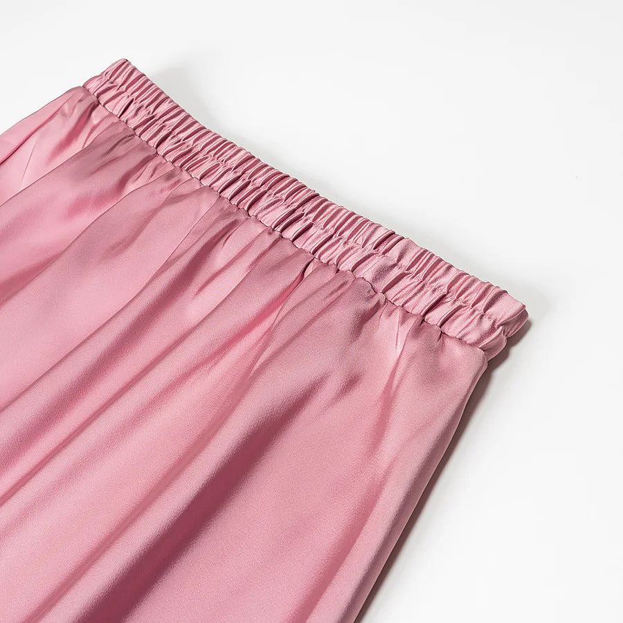 Women’s flowing midi skirt with elastic waistband and asymmetric seam Mune Fashion