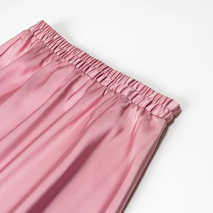 Women’s flowing midi skirt with elastic waistband and asymmetric seam Mune Fashion